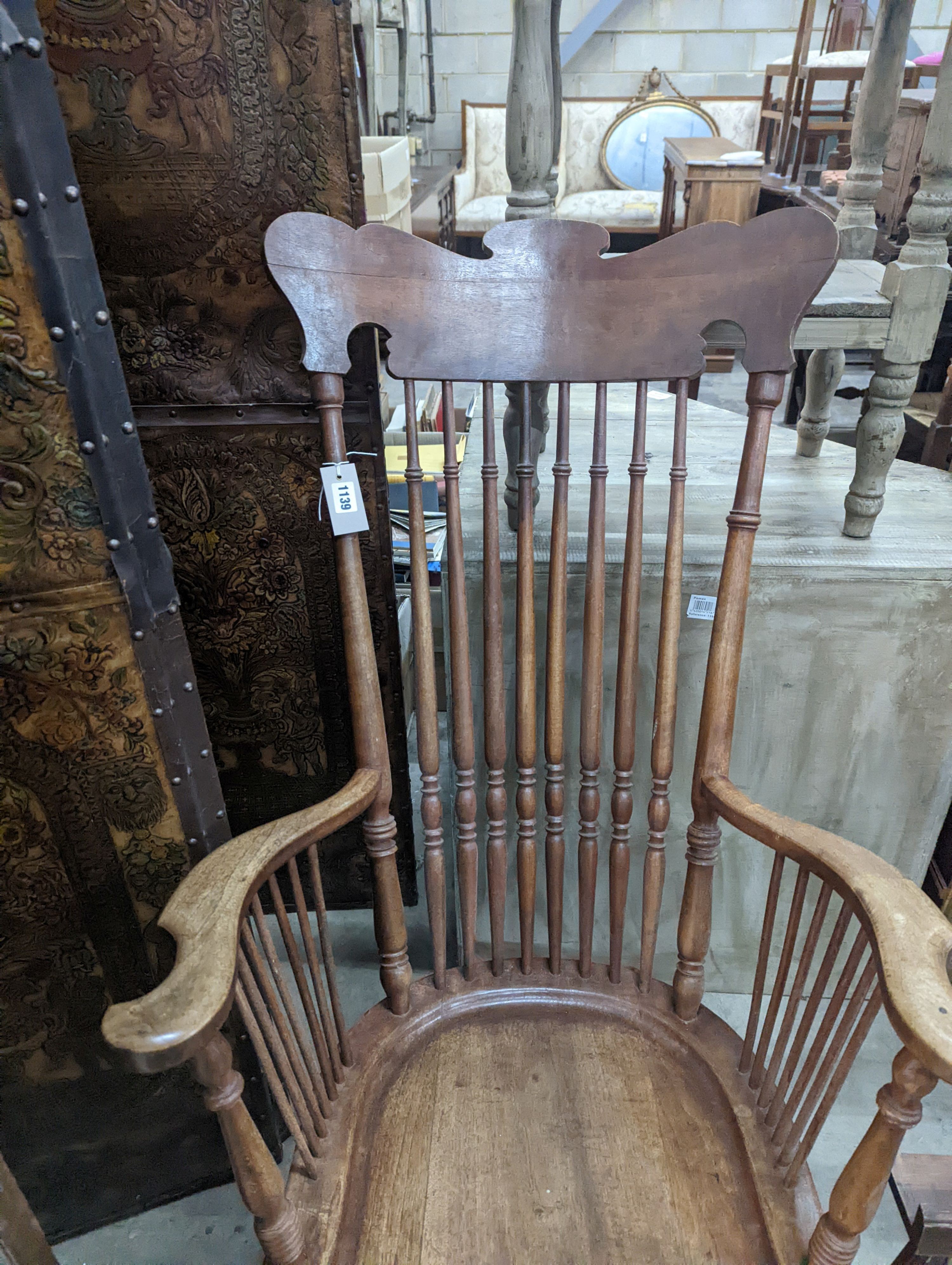 A rocking chair, width 64cm, depth 50cm, height 120cm